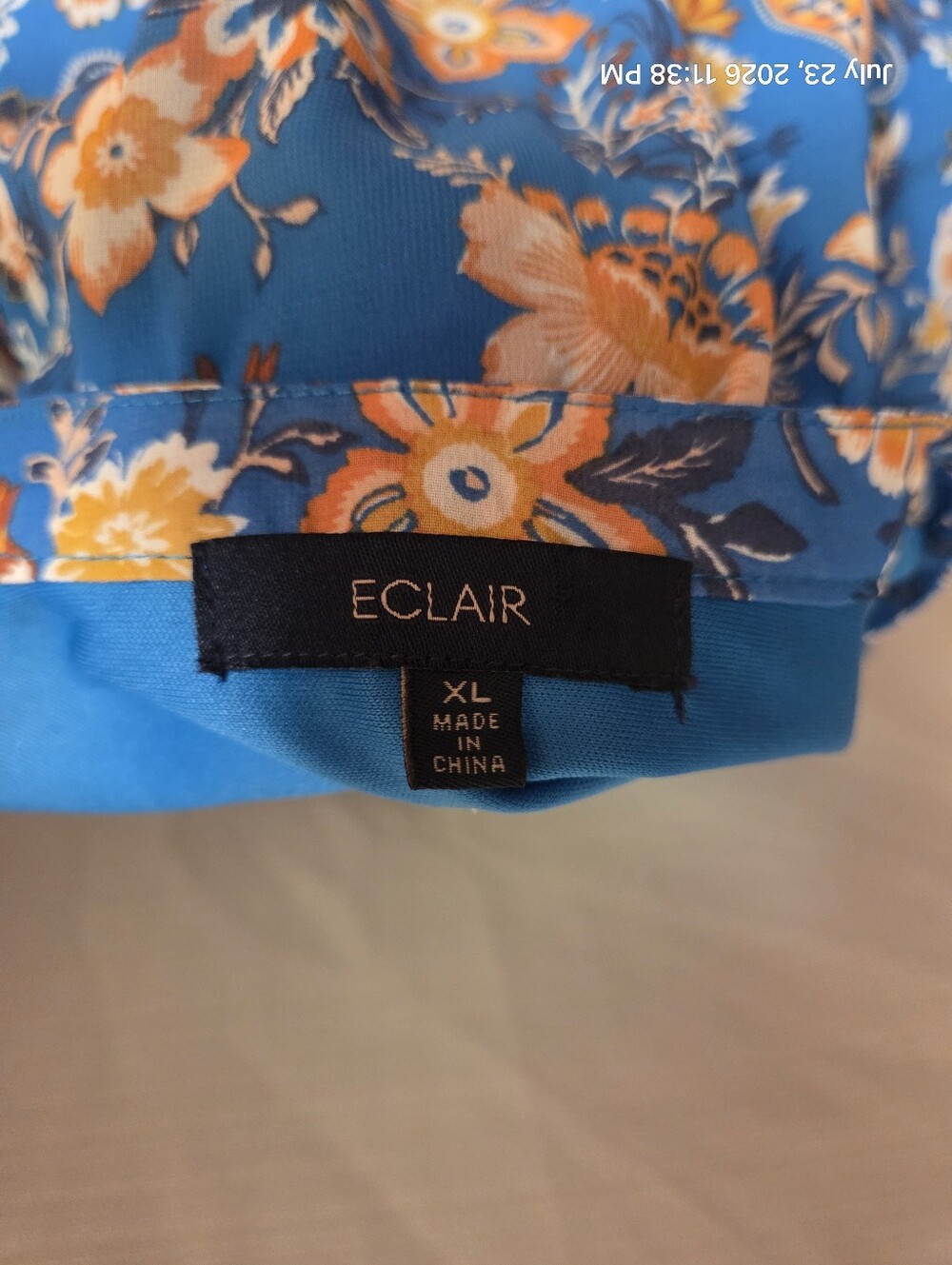 Women’s Blue Floral Paisley Tie-Neck Blouse - Picture 7 of 8
